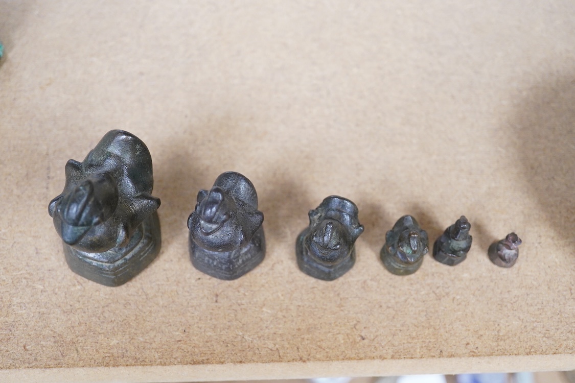 A graduated set of six Burmese bird opium weights, 7cm high